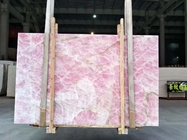 バックリットのアイス・エイジシリーズのオニックス大理石の壁パネルの半透明な水晶ピンクのオニックスのカウンタートップ