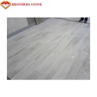 シュニールの白い木製の大理石のタイル、磨かれた大理石に床タイルの滑らかな見ること
